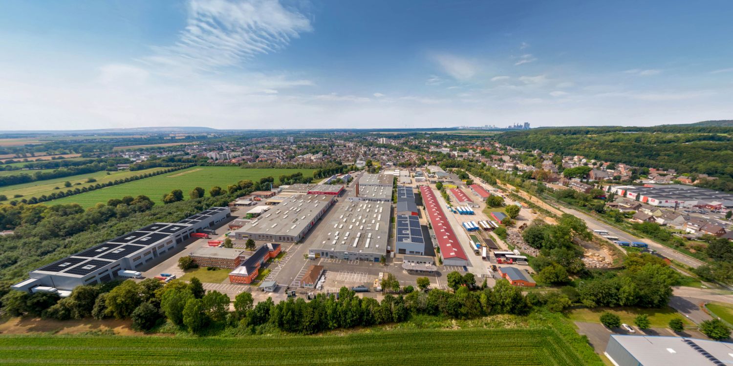 The visualization shows the Alpha Industrial Business Park Bergheim at the completion of the first three new buildings. Hall 4 is on the left of the picture. Image rights: Alpha Industrial